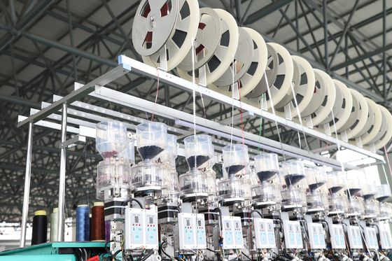Máquina de bordado de colchas de biscoitos 20 cabeça 4 cores com rolos